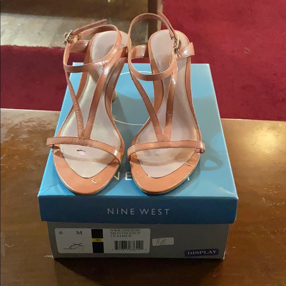 Selling size 6 medium orange Leather Shoe